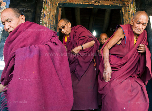 Old Monks at Thikse Monastery. Most monks don't last that long in a monastery these days. After 18 years most monks choose to leave the monasteries and lead a quite domestic life with their families. With awareness about family planning , very few families have more than two children and don't want to send any of them to the monasteries now. If this continues the monasteries in Ladakh and elsewhere are bound to become museum pieces one day. (sanjay austa austa)